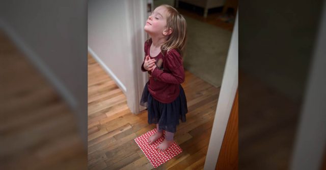 Mom Asked Her Daughter What She Was Doing Standing On Heart-Print Paper: “I’m Sending Love To The World”