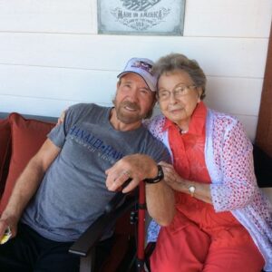 The mother of Chuck Norris, who worked night shifts to lift her three sons out of poverty, celebrates her 102nd birthday.