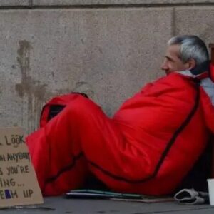 She buys a homeless man a meal and sits down with him: He hands her a crumpled letter before leaving