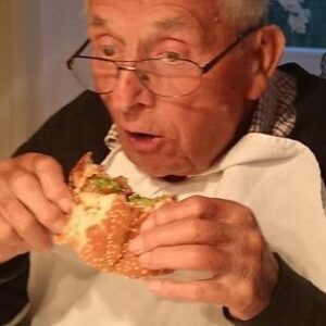 Old man orders a single hamburger