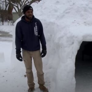 Man takes advantage of huge snow dump and builds an incredible multi room igloo for his family