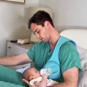 Mom gushes over video of her husband feeding their baby with breastfeeding tool