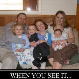 Can you identify the horrible secret that is concealed in this family picture?