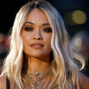 Rita Ora sizzles in teeny pink crop top and blazer as she shows off washboard abs Rita Ora sizzles in teeny pink crop top and blazer as she shows off washboard abs