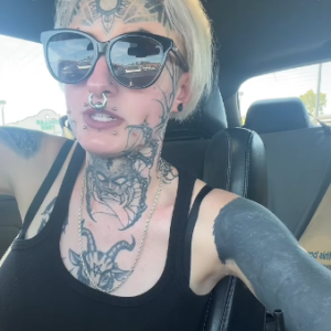 A young woman with facial tattoos and piercings confronted TJ Maxx employees after she was rejected a job.