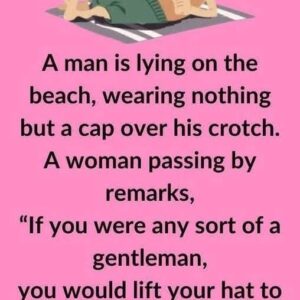 A man is lying on the beach..