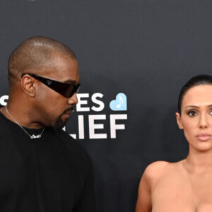 Lip reader decodes what Kanye said to almost-nude wife at Grammys