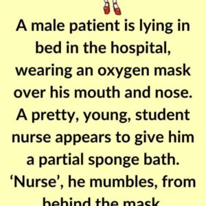 A male patient is lying in bed in the hospital