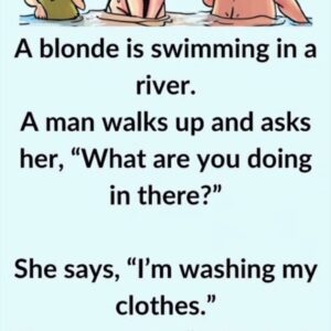 Video: A blonde is swimming in a river.