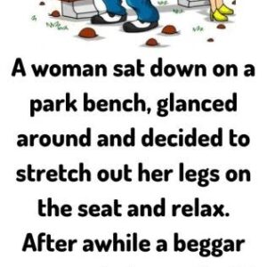 A woman sat down on a park bench