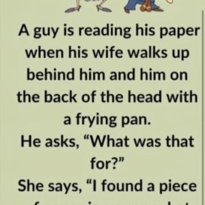 Video: A guy is reading his paper when his wife walks up behind him